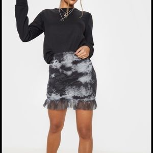 PRETTYLITTLETHING Black Mesh Tie Dye Mini Skirt